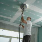 man-polishing-the-ceiling